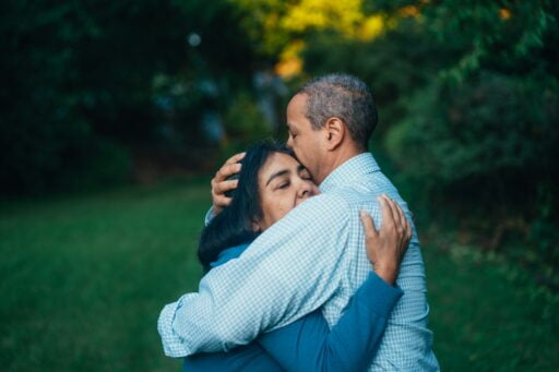 man and woman embracing and forgiving each other.